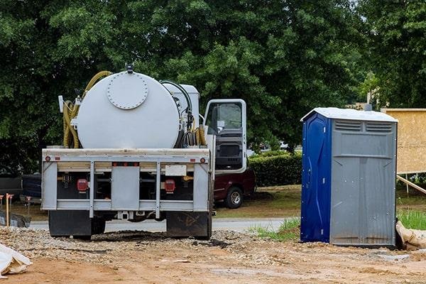 Clean interior of a portable restroom unit